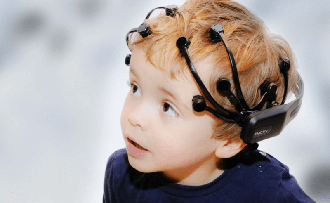 child wearing emotiv epoc+
