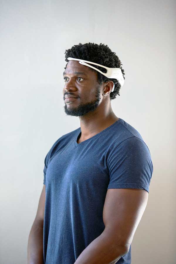 a man wearing Emotiv insight headset brain waves measuring data hardware neurotech